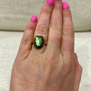 Green and Gold colored ring